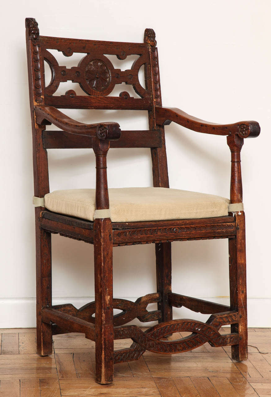 A Continental Baroque Oak Armchair