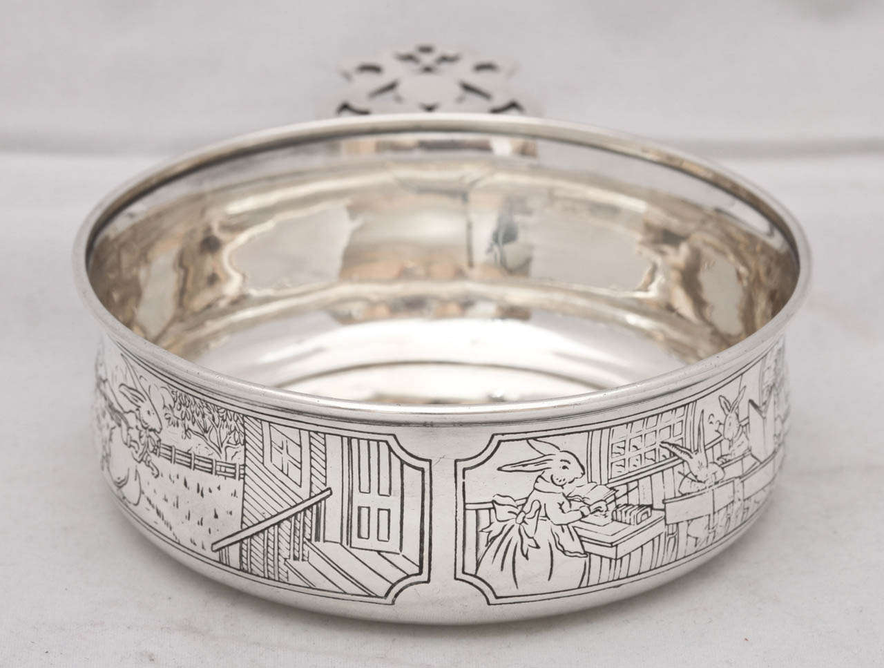 Sterling silver baby porringer decorated with a 