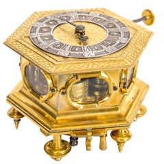 A small and early German brass hexagonal horizontal table clock, circa 1680