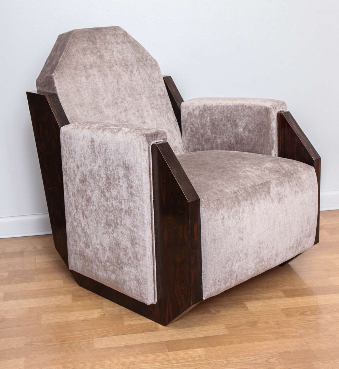 Elegant pair of Art Deco armchairs in the manner of Andre Sornay. Ziricote wood with cotton/silk velvet upholstery.