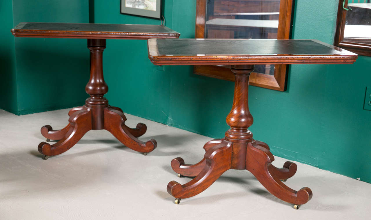 A pair of solid mahogany mens club tables. Manchester England c. 1860.