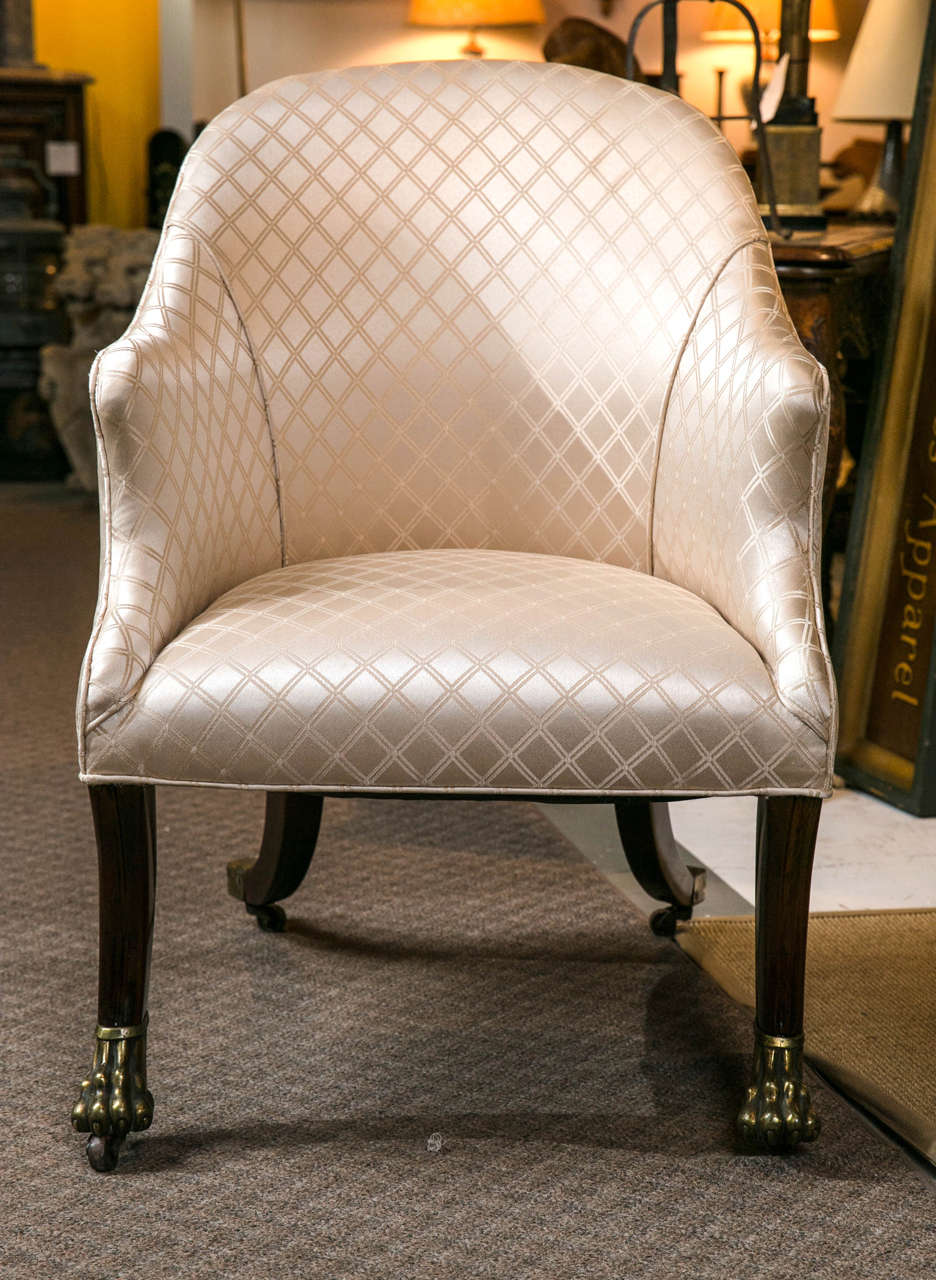 c. 1810 English regency slipper chair, with cast bronze feet.
