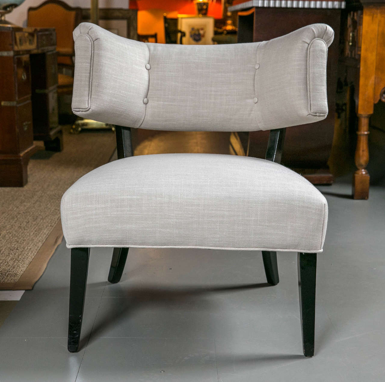 A pair of low chairs in the style of Billy Haines, c. 1940's.