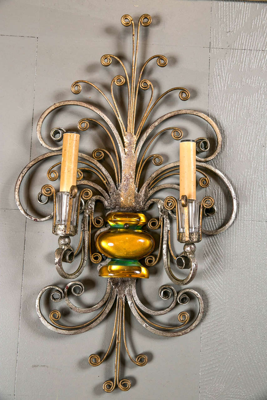 Pair of French double light sconces, circa 1930s. Silvered metal unusual scrolled design.