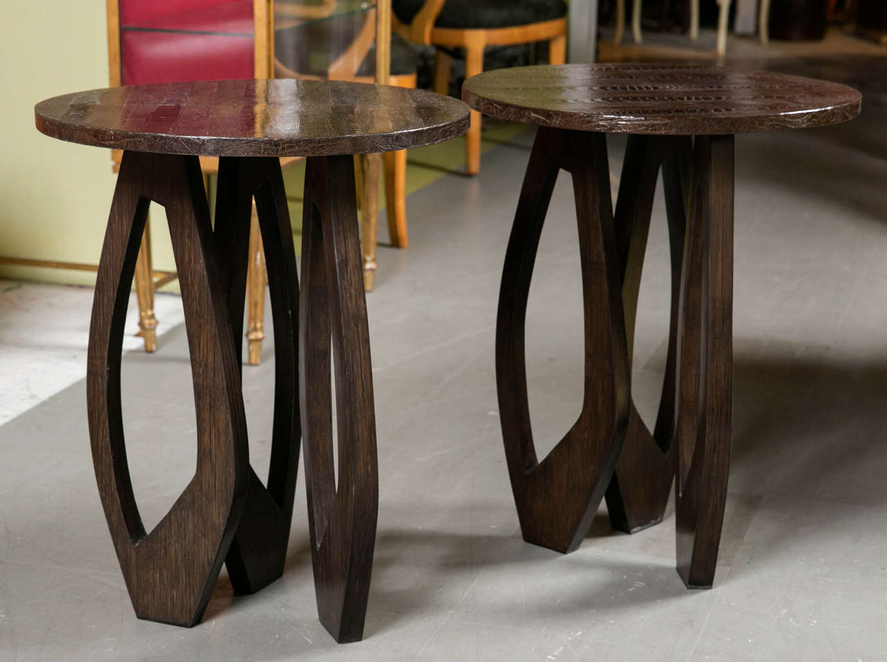 A pair of mid century side tables with snake skin tops, by R&Y Augousti.