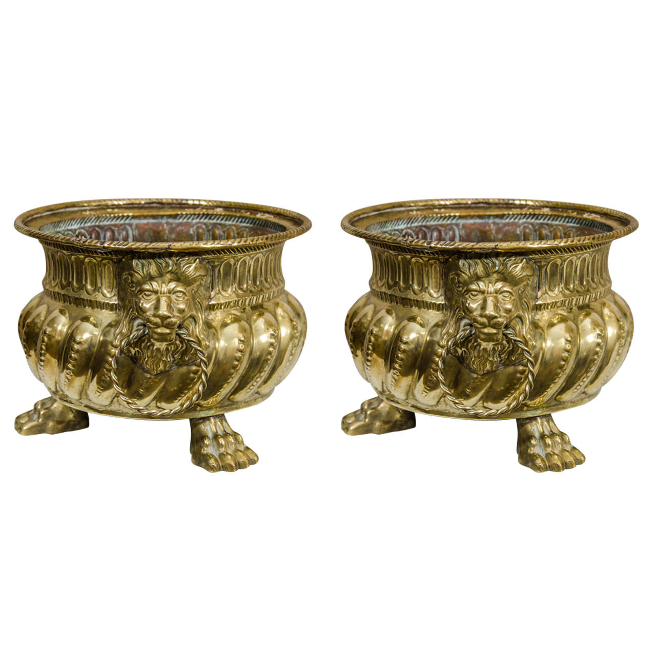 A Pair of Continental Regence Style Brass Repoussé Cachepots For Sale