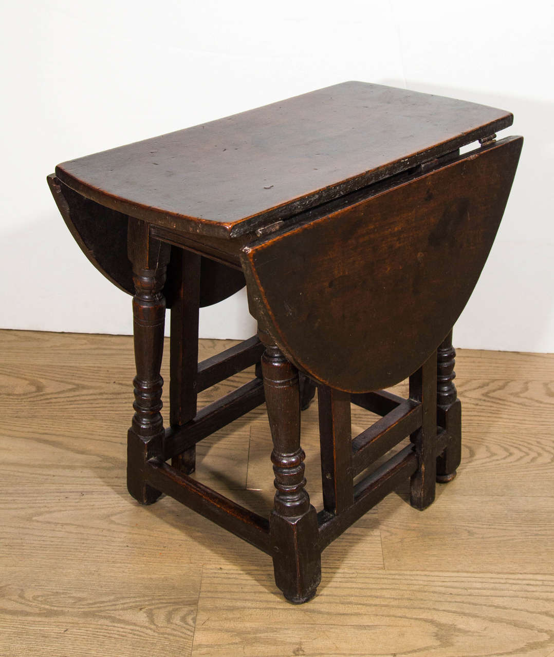 An English Patinated Chestnut and Walnut Gate-leg Side Table For Sale 2