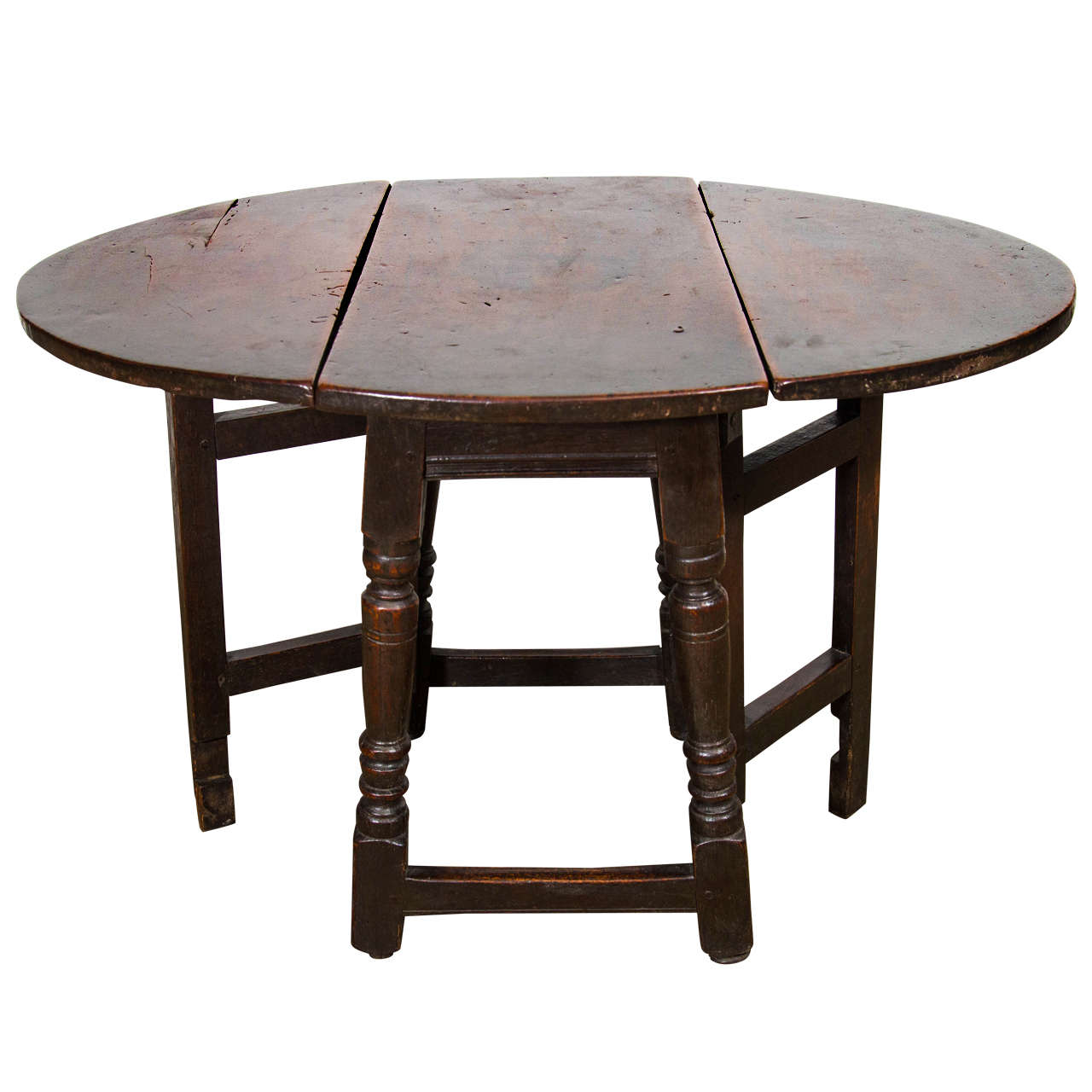 An English Patinated Chestnut and Walnut Gate-leg Side Table For Sale