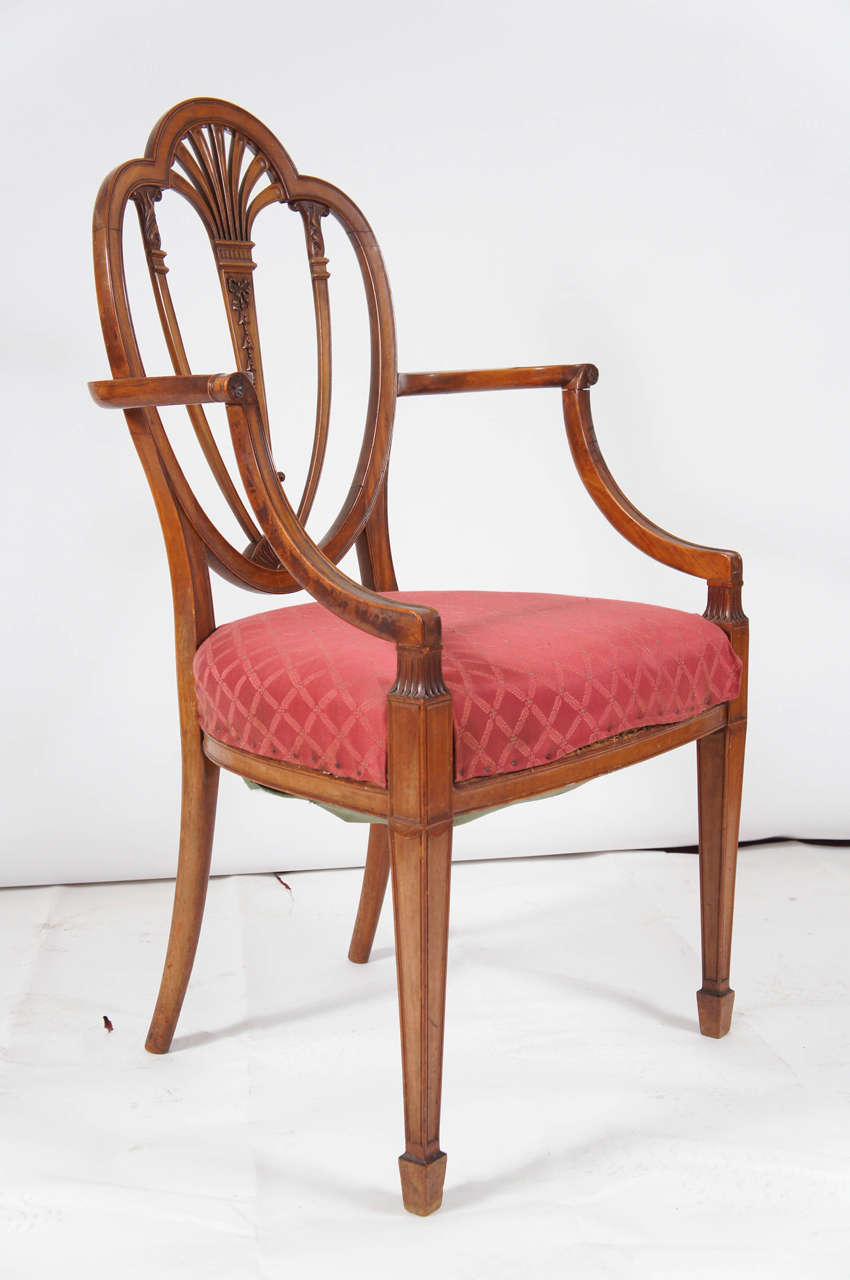 Supreme elegance in the style of the work of England's great 18th century neoclassical architect and interior designer Robert Adam.  Glorious carving.  Excellent chair for a desk or extra seating.

Arm height is 29