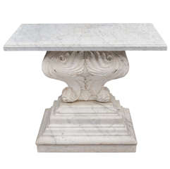 An impressive mid C19th William Kent style carrera marble console table