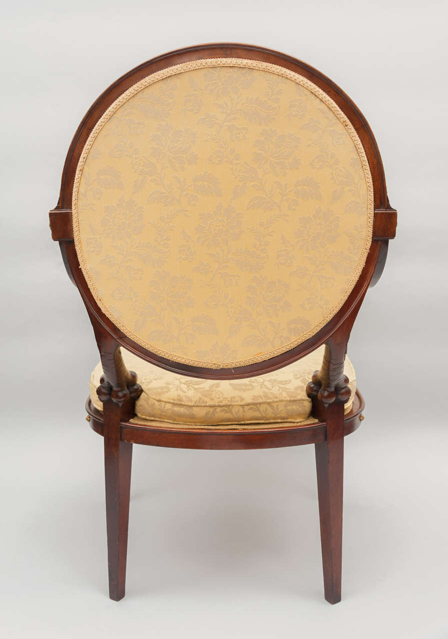An early C19th rare and extremely stylish Russian mahogany open armchair 5