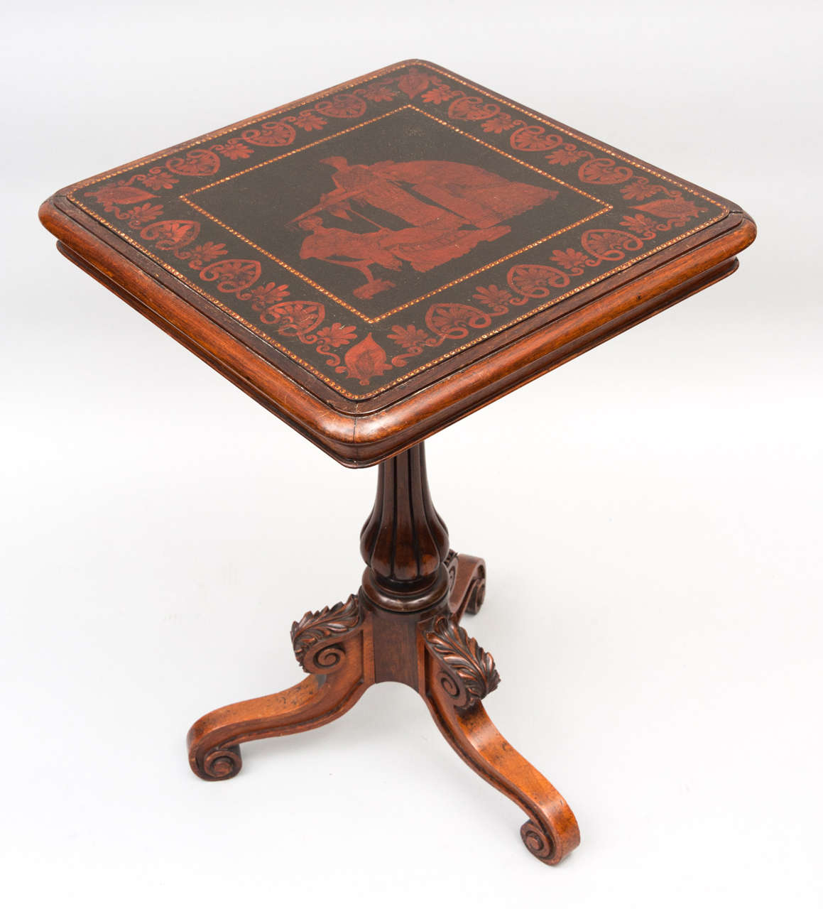 A late Regency rosewood unusual occasional table with the original painted decorated top, featuring a classical scene of two maidens attending a lady, within an anthemion border, set into a rosewood frame. The base on a fluted baluster support and