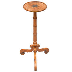 A very stylish regency birds eye maple and brass occasional table