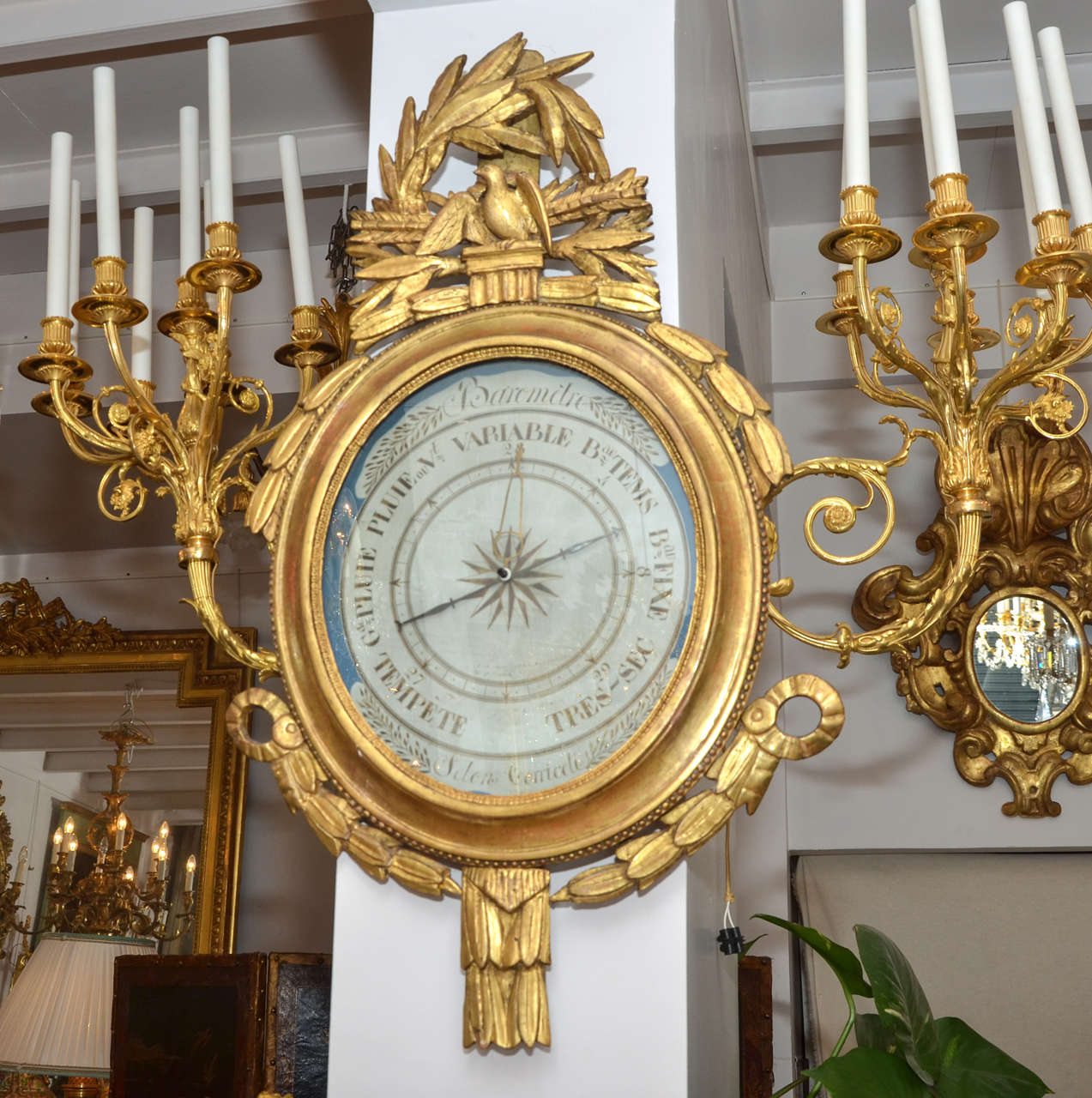 Gorgeous  gilded wood round barometer, 18th century