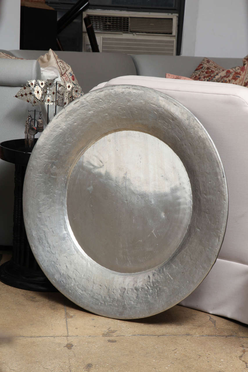 A Turkish Sini, large metal tray traditionally used to serve fruit, breads, and condiments.Two sizes. Size and price of largest below.