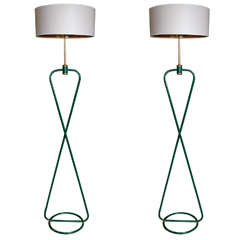 Two Figure-of-eight Standard Lamps By Comte