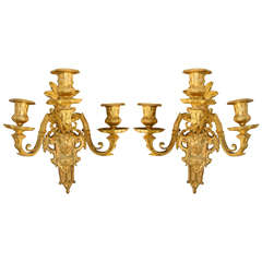 Pair of 3-Arm Figural Bronze Sconces with Cross Torch Design