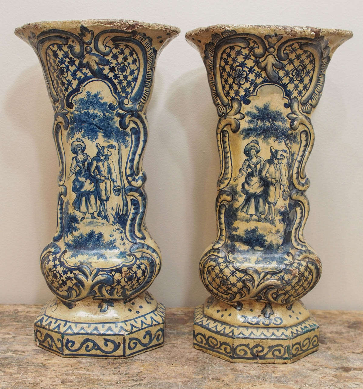 A pair of rococo style papier mache vases, which we've dubbed 