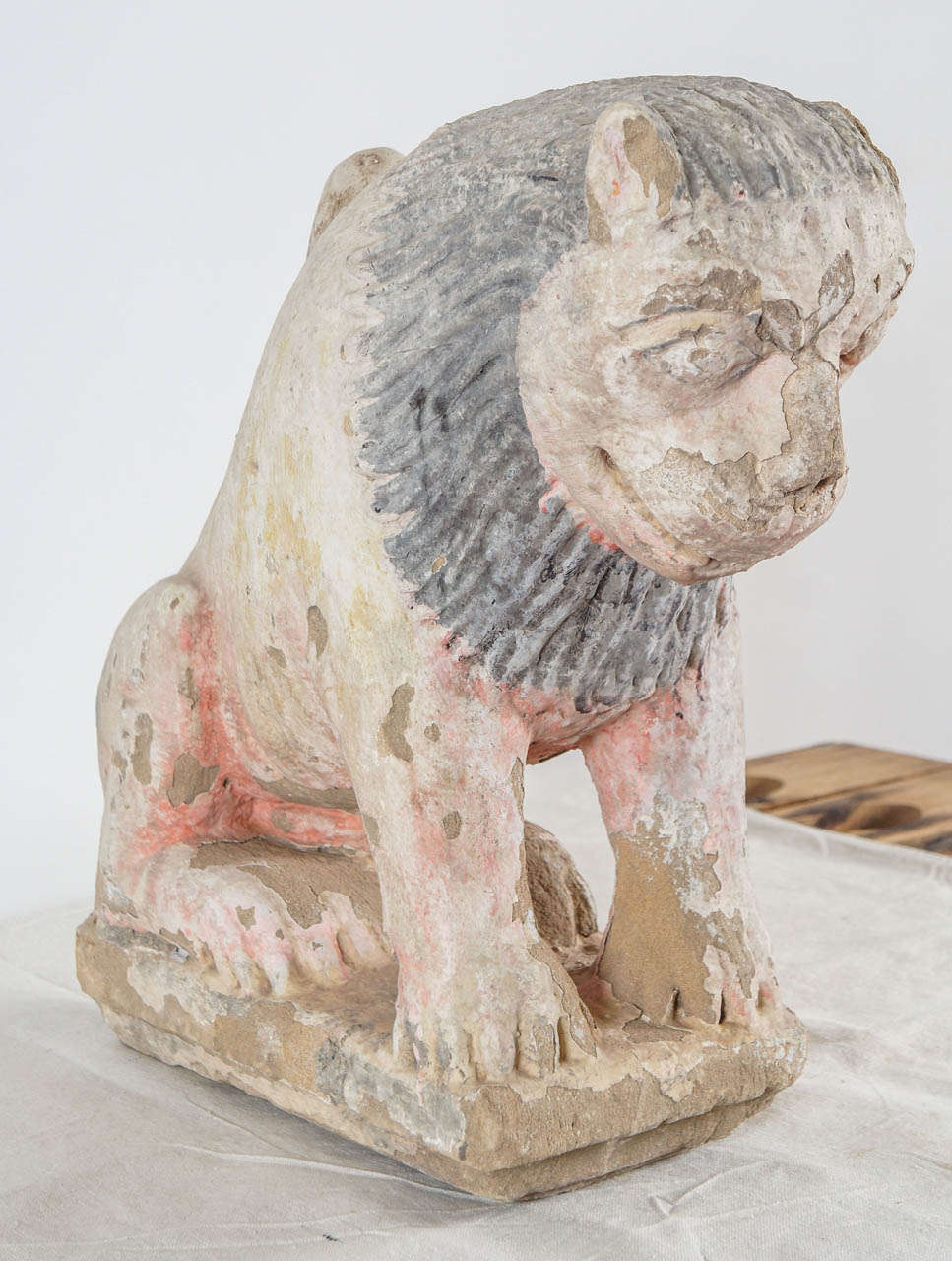 Primitive Crouching Painted Stone Lion Statue at 1stdibs