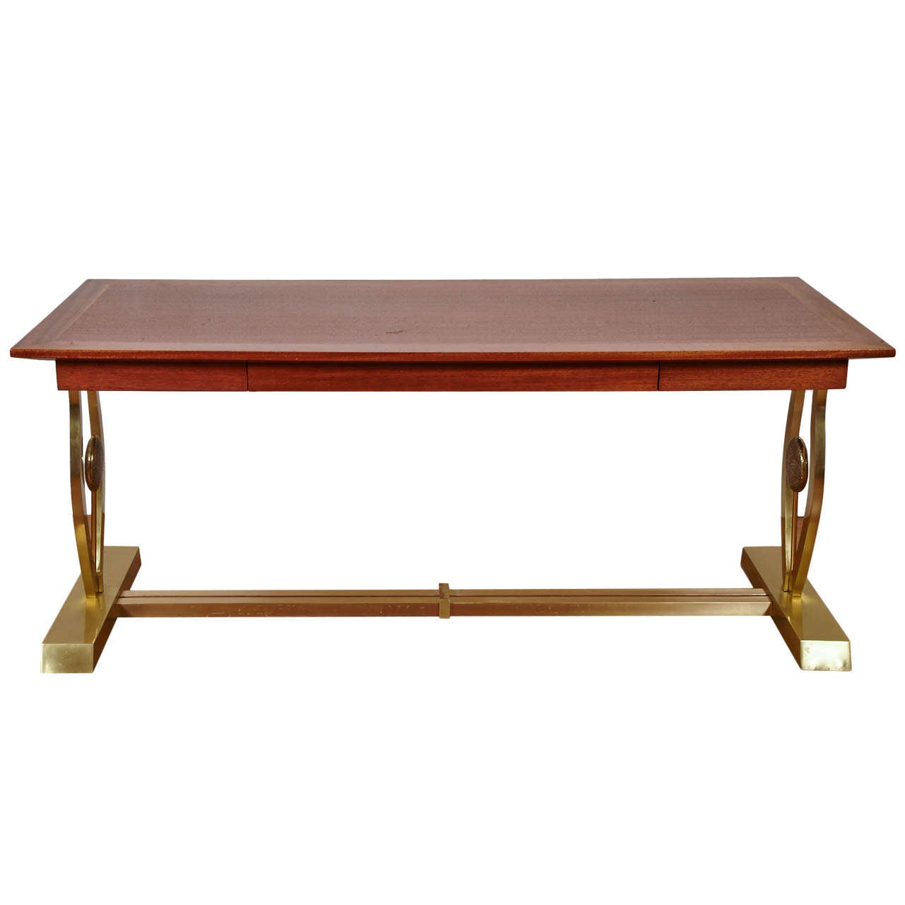 A rare elegant rectangular console or desk table, with a mahogany top with drawer and gilt brass and wood base with lyre sides, by Maison Jansen, 70's.
Height. 28,3 x width 68,5 x depth 28,7 inches.