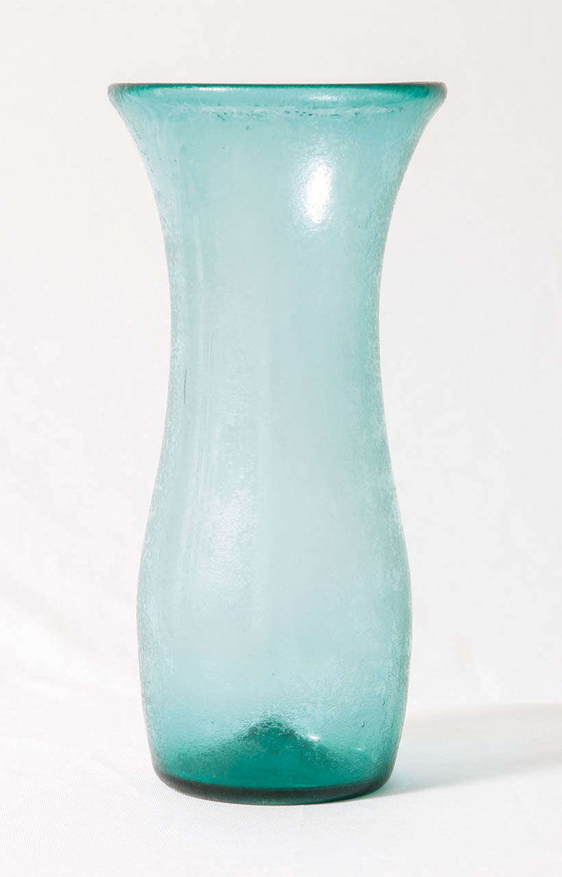 'Corroso' vase in acid-corroded jade green glass designed by the Italian architect Carlo Scarpa (1906-1978) and executed by Venini, glassworks in Murano, Italy.
Signed under the base with the pre-war two-lined signature 'Venini Murano'.
Model
