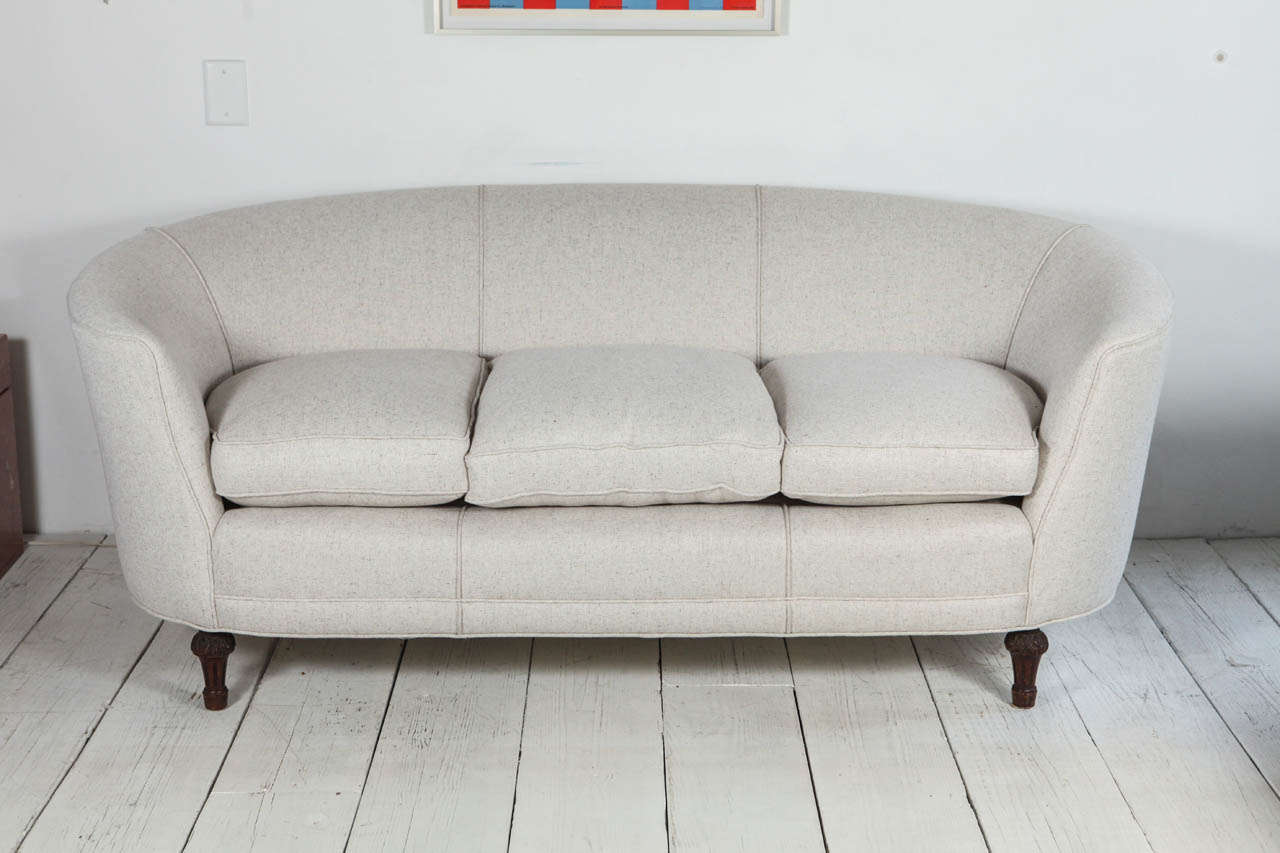 Vintage three seat sofa reupholstered in cream linen.