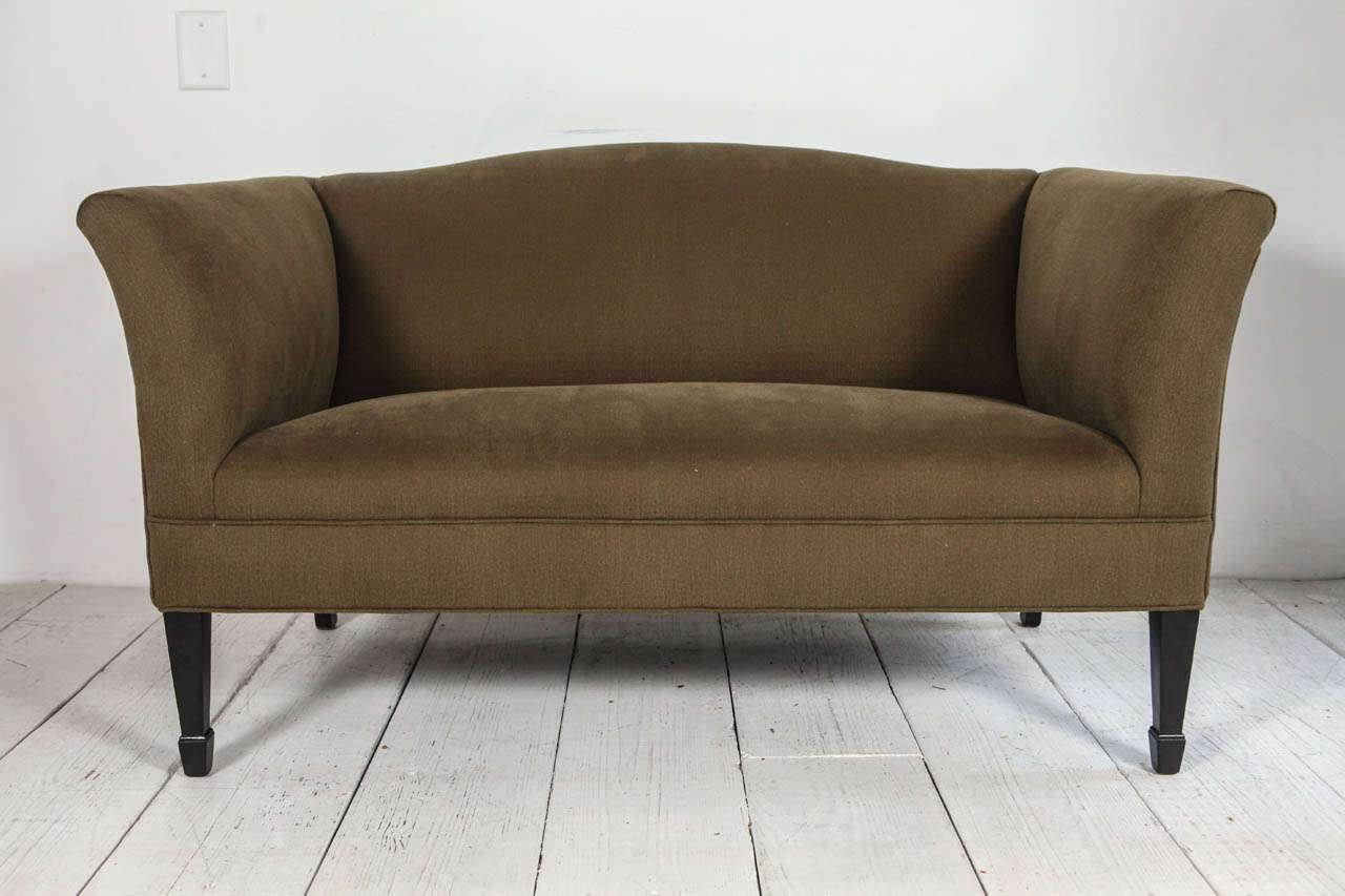 Tuxedo style sofa reupholstered in olive cotton denim.