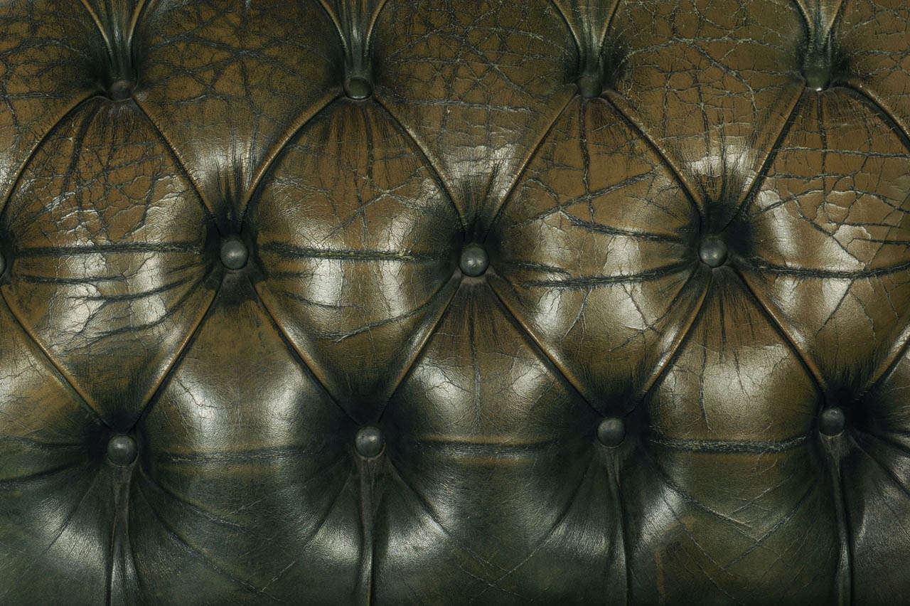 vintage green leather sofa