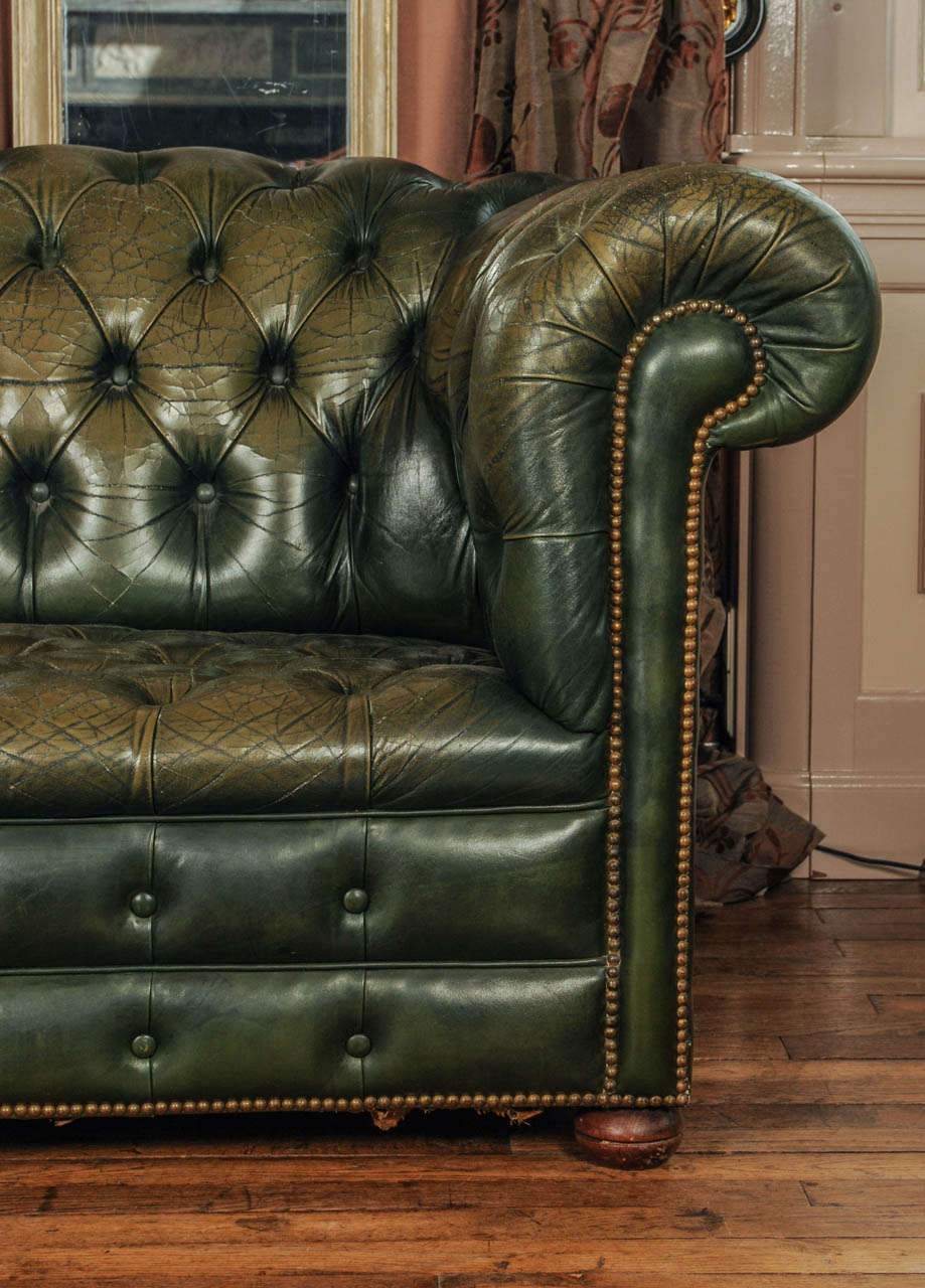 green leather chesterfield couch