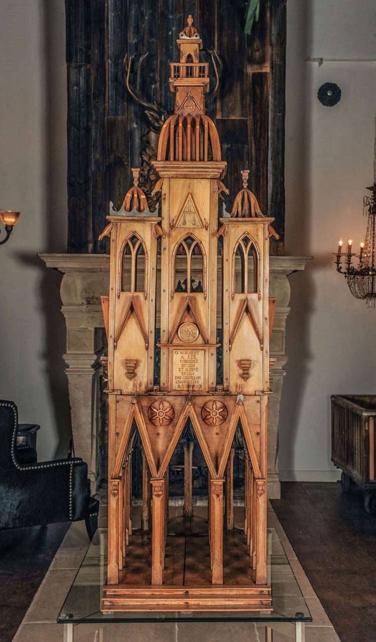 A large architectural model of a cathedral with masonic signs. The large scale model was made by Grépillon, carpenter in the city of Trevoux, near Lion. The model is made of nutwood wit sink details. The front of the facade is provided with a