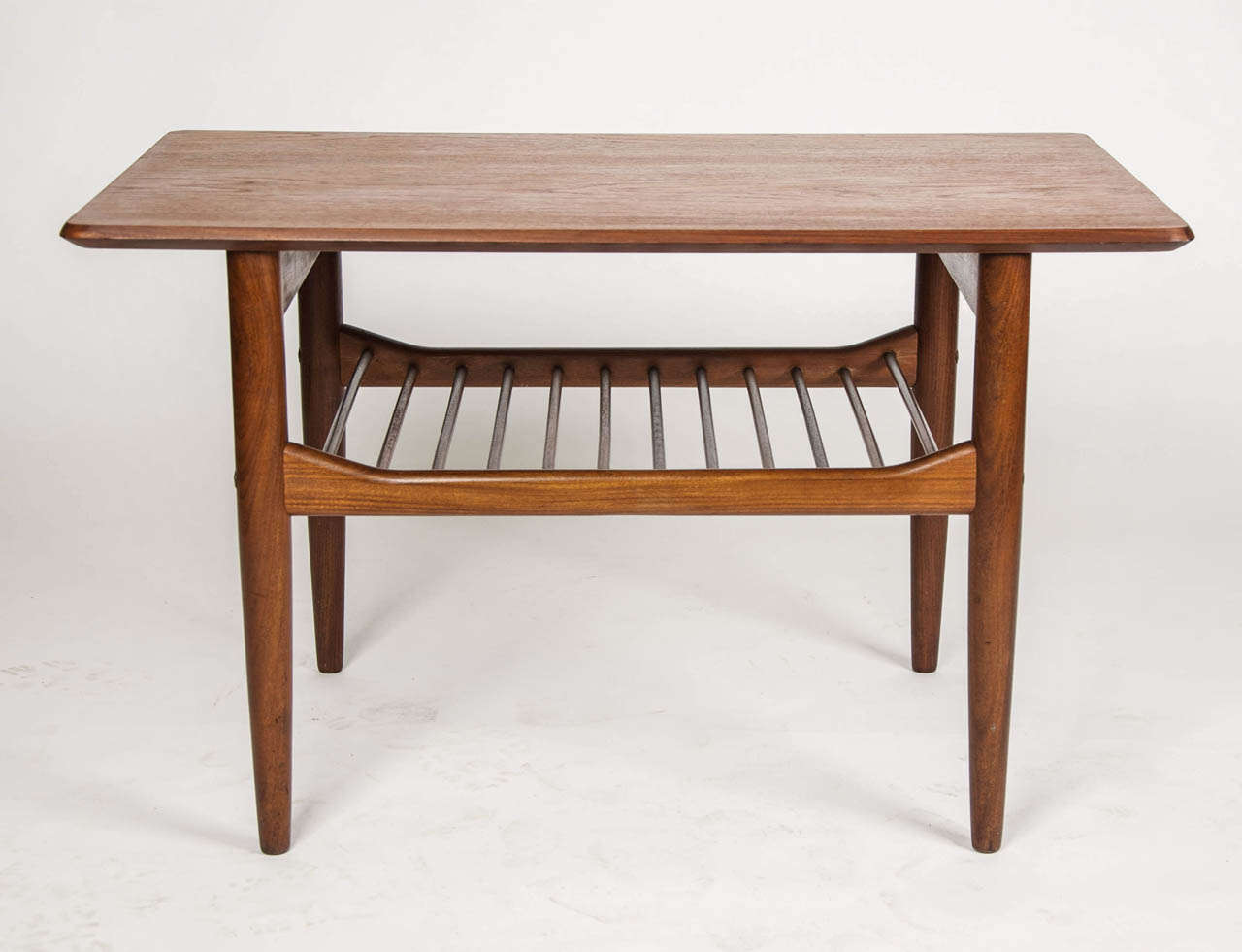A 1960,s teak coffee table manufactured by G-Plan and designed by Ib Kofod- Larsen. Fully marked on the underside of the table top.