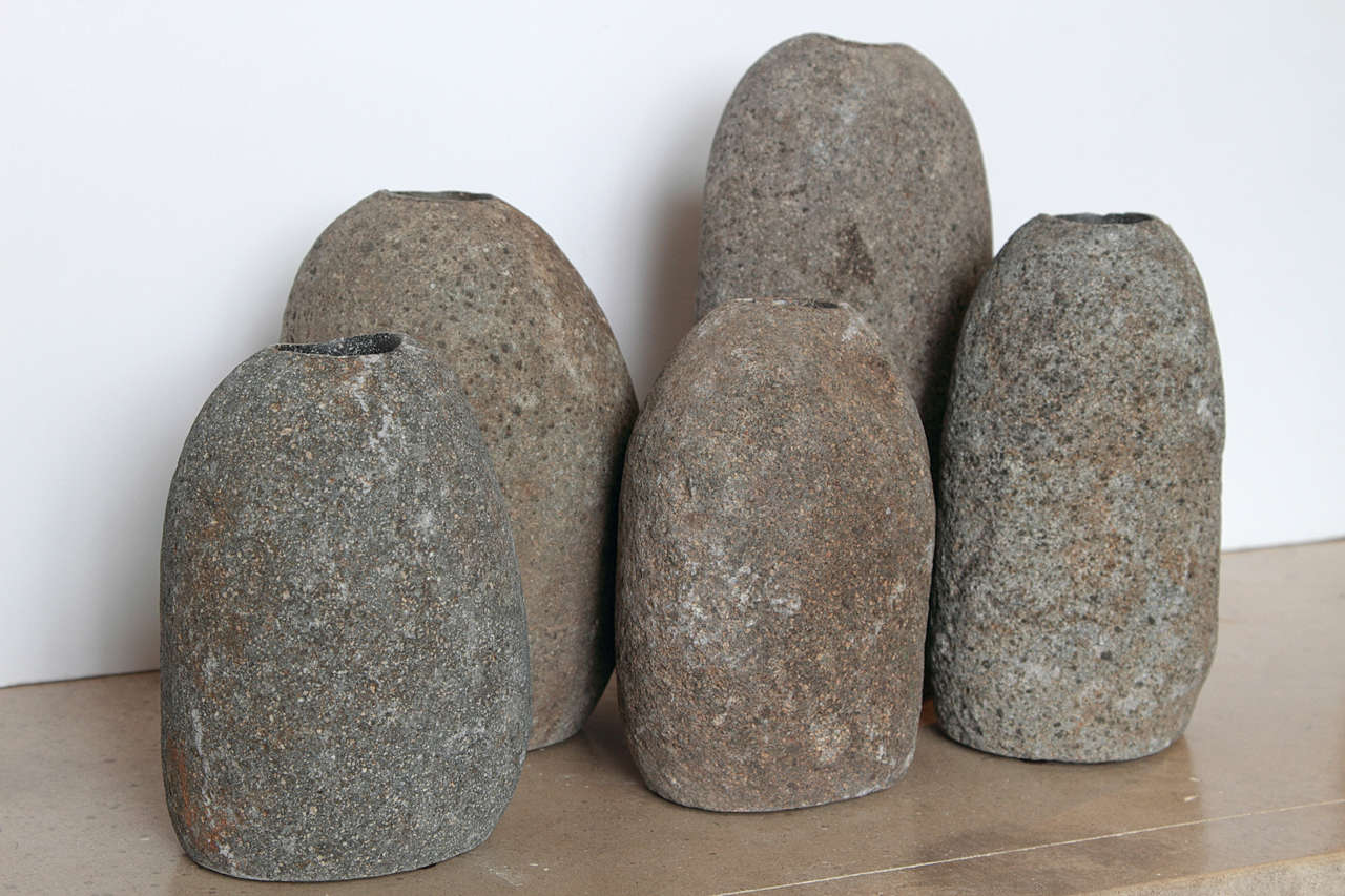 Imported from the Jordan River by Jerusalem, these earthy, primitive river rocks are hand chiseled to perfection with an insert for tea cup candle holders. 

Vary in sizes, average height of 10” or more of solid antique river rocks. 

Can be used