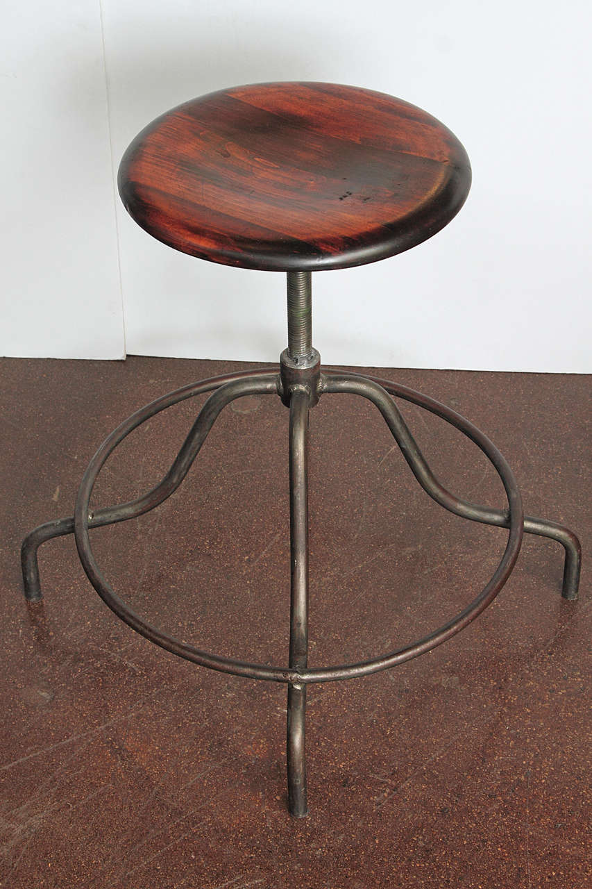 Industrial French Shop Stool 
Iron & Wood 
Diamater of Seat 14.5