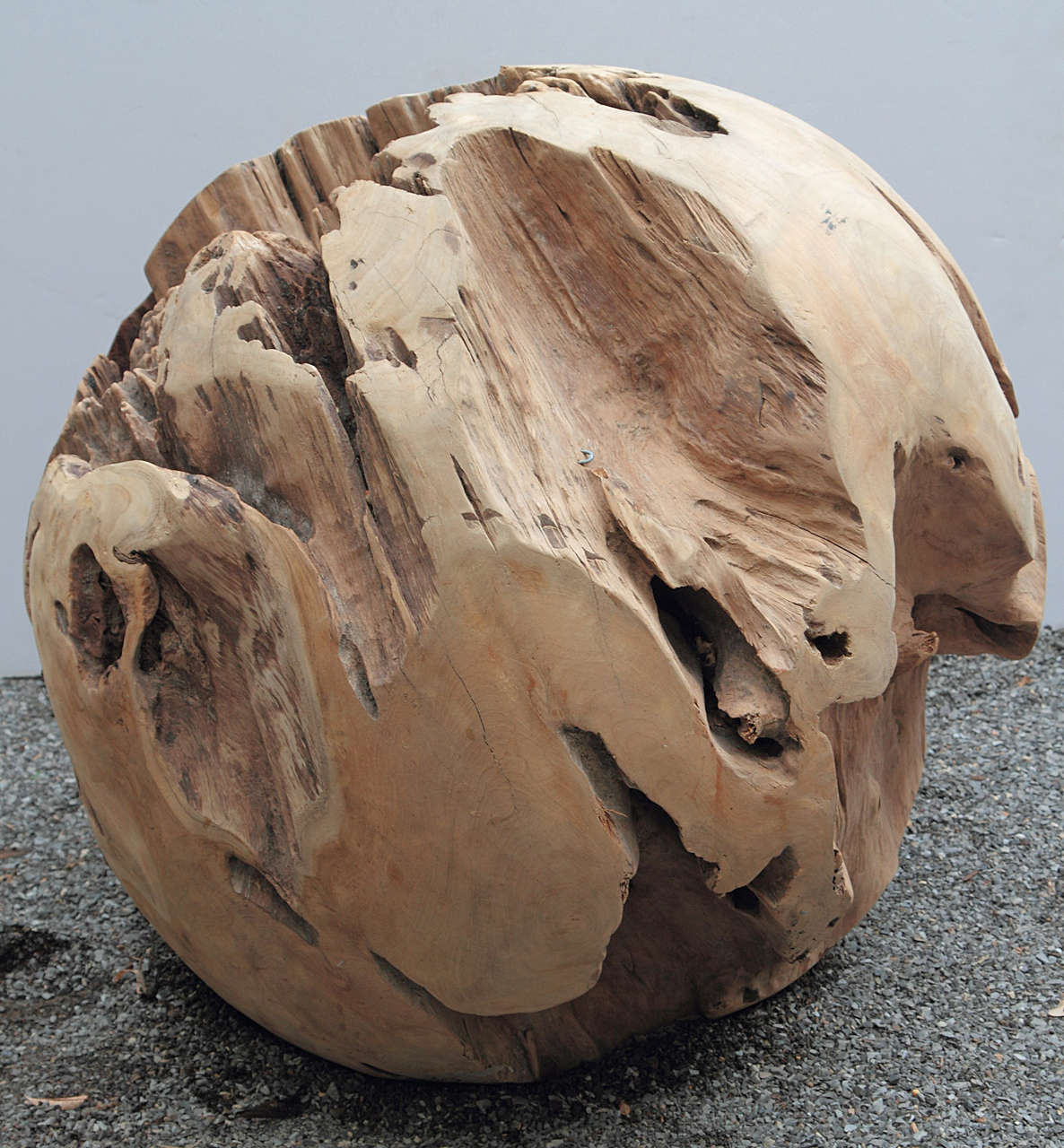 Antique wood balls made of hundred year old teak tree roots
will give you a strong natural look for home decor or garden accessory 
Large teak ball for indoor and outdoor use
The teak balls can be cut flat to make teak ball seats and teak ball