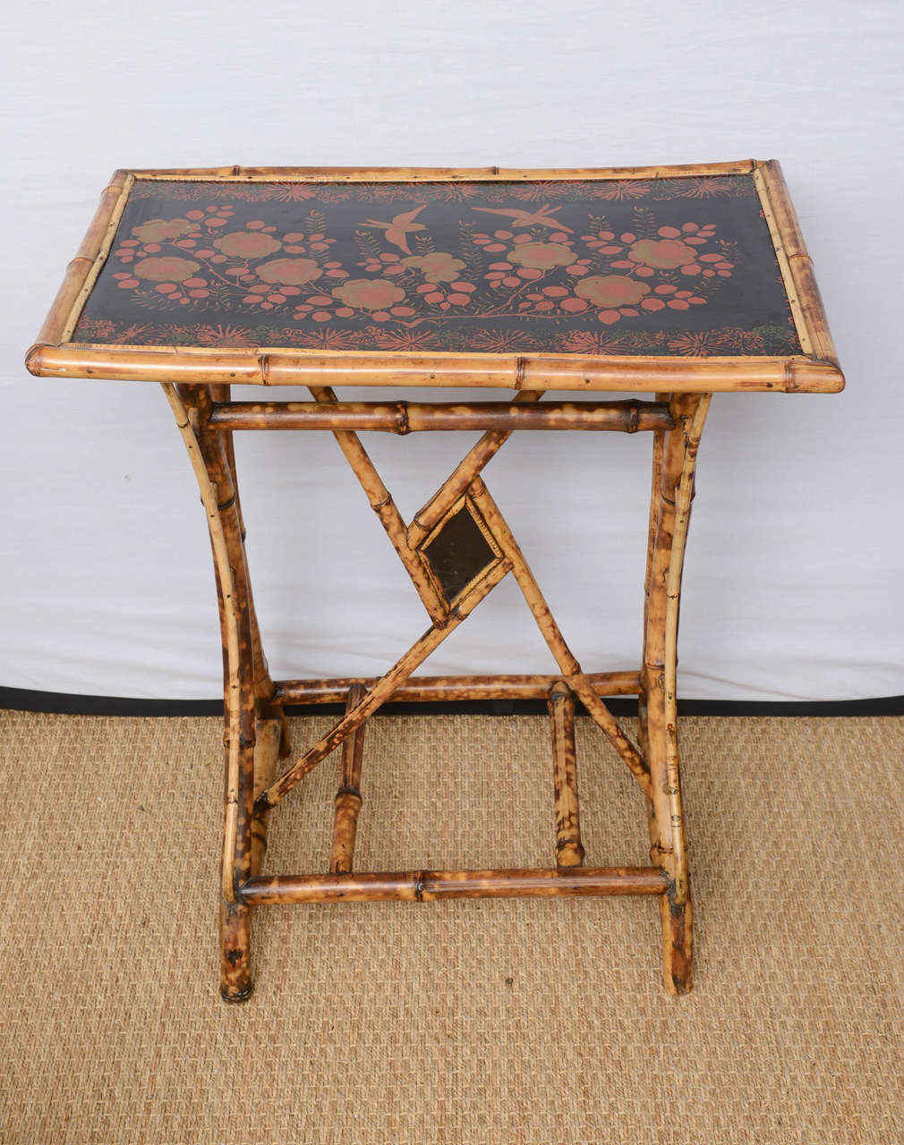 English bamboo table japanning lacquer with beautiful motif of flowers and birds.