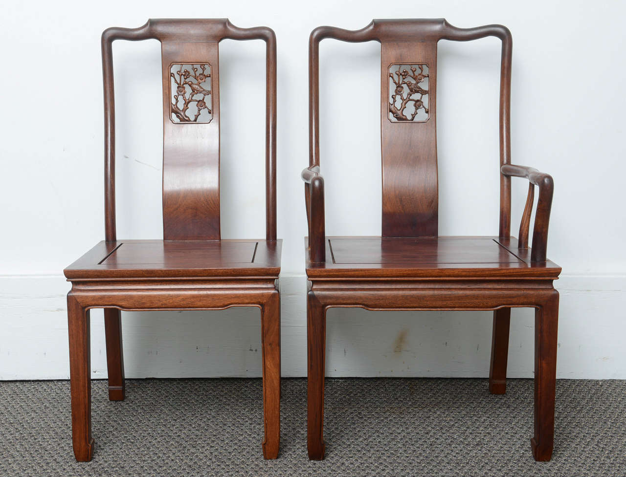 These are a very nice set of eight dining chairs consisting of two-arm chairs and six single chairs. They are all very solid and sit on square tapered legs, with a carved bird to the center back slat.
Not really sure of the wood maybe mahogany