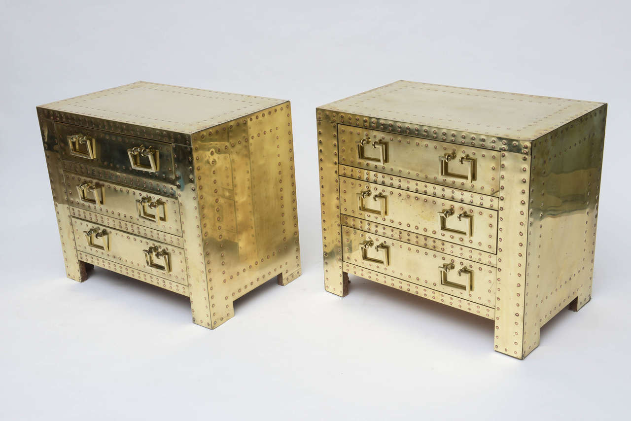 Great proportions and a pleasing design.
Brass-clad wood chest with three drawers,
brass stud trim and pulls.