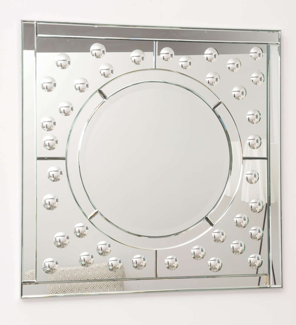Stunning square 1980s beveled and bubbled bullseye convex mirror. This mirror measures 35 inches high by 35 inches wide.

Please feel free to contact us directly for a shipping quote, or other questions and information including making an offer by