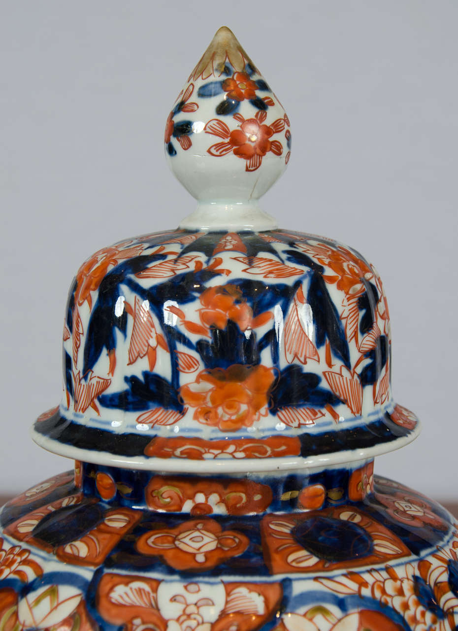 Hand-Painted 19th Century Lidded Japanese Imari Jar with Flame Shaped Finial