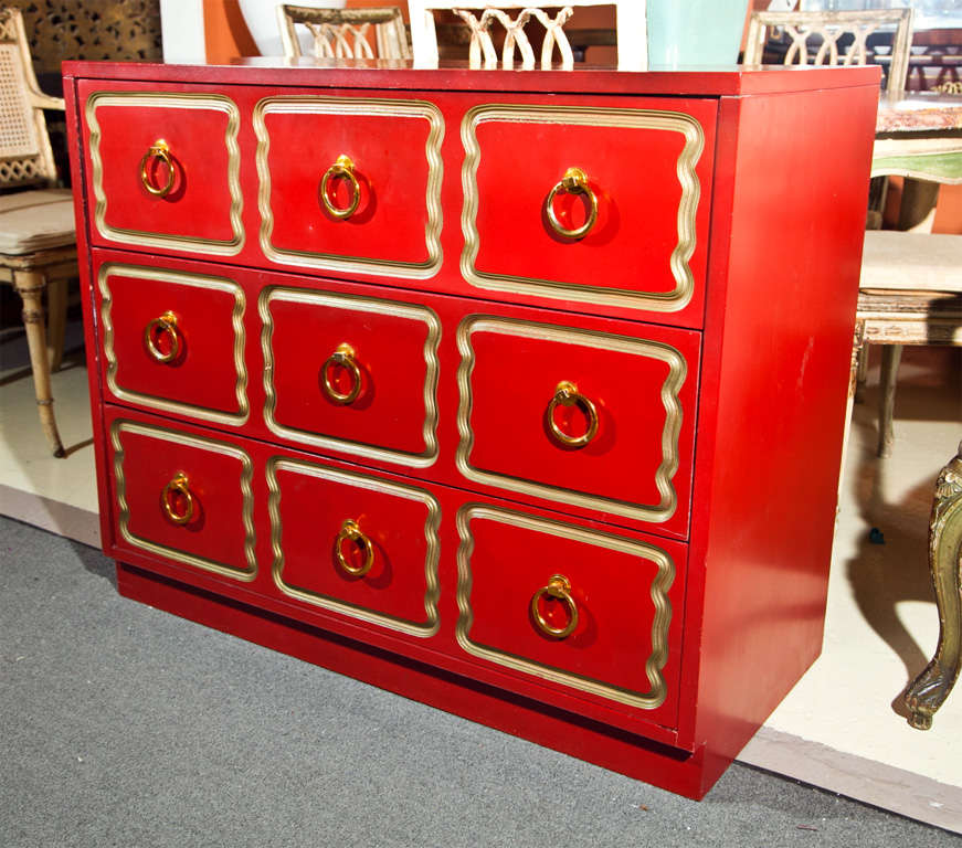 Fine fire red and gilt gold Dorothy Draper Style chest of drawers. Painted and polished to a nice shine.