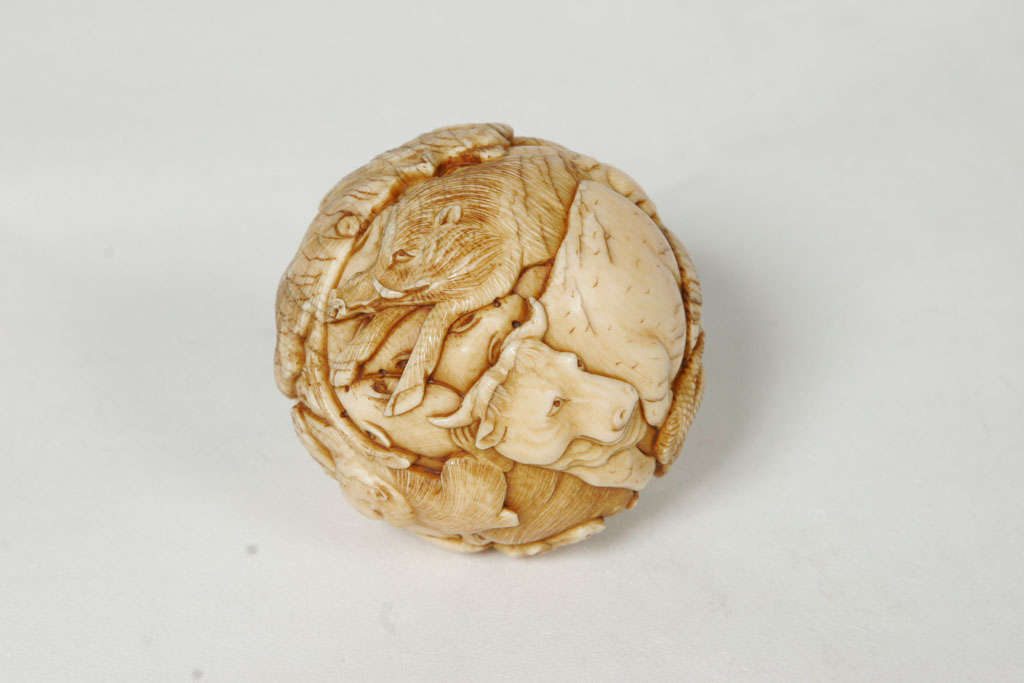 19th Century A 19th century Japanese Ivory spherical Okimono.