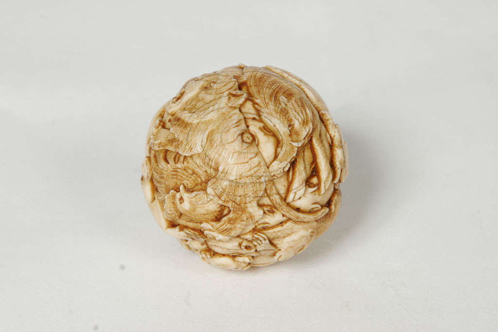 A 19th century Japanese Ivory spherical Okimono. 1