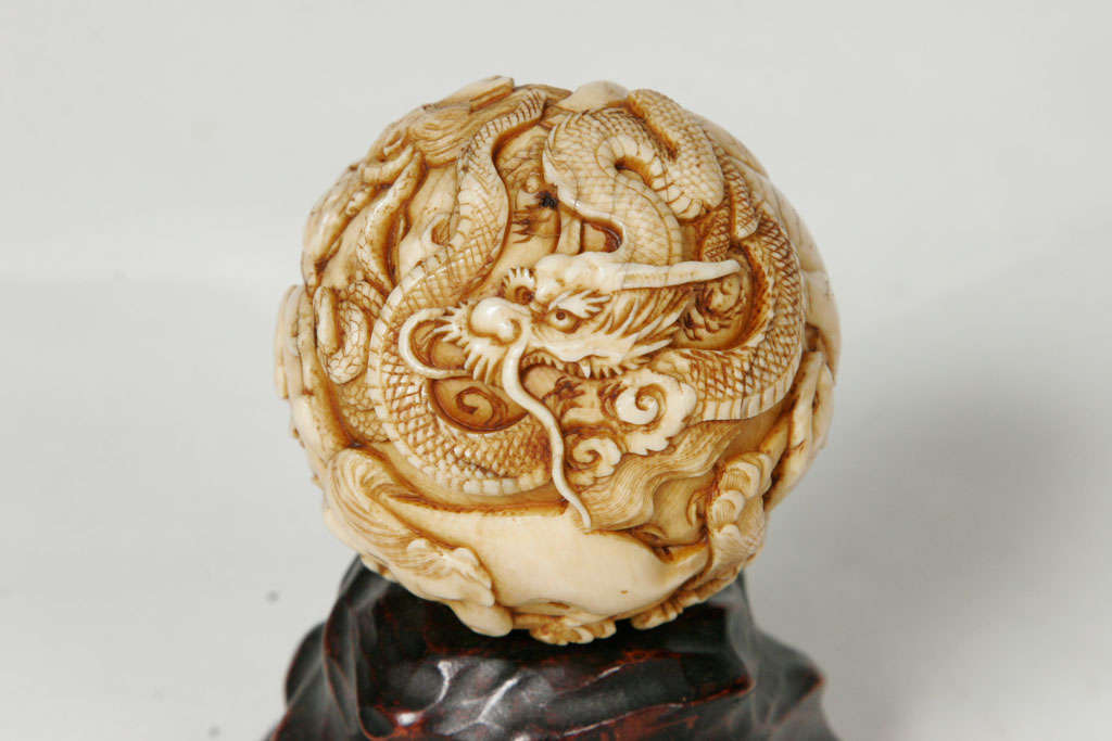 A 19th century Japanese Ivory spherical Okimono. 2