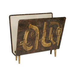 An early Piero Fornasetti Magazine rack.