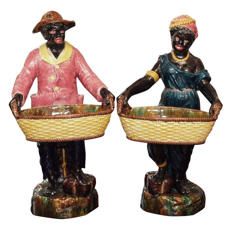 Pair Of French Majolica Black Figures Sitting On Cotton Bales
