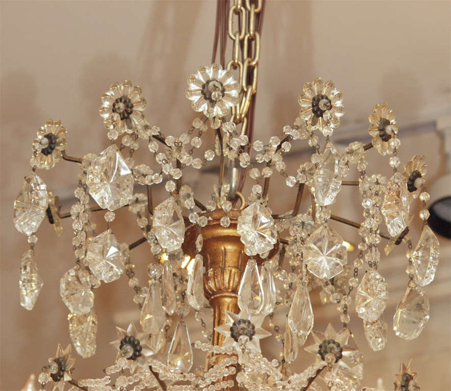 Spanish Gilt wood stem Crystal dressed chandelier of large size