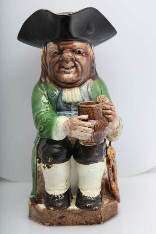 A rare Ralph Wood pottery shield toby jug with medallian saying 