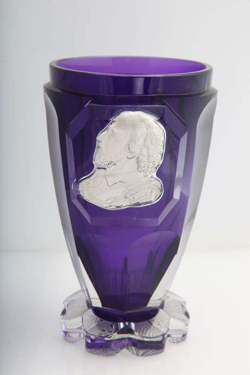 A rare John Ford sulphide vase with a portrait of Shakespear, the upper section in purple glass and the base engraved clear crystal