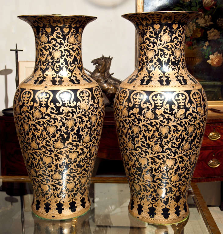 A PAIR OF OVERSIZED PORCELAIN VASES WITH GILT DECORATION IN THE EASTERN MANNER, OVER A BLACK GROUND
Please feel free to contact us  by using the  CONTACT DEALER link on this page or by calling 203-263-1913