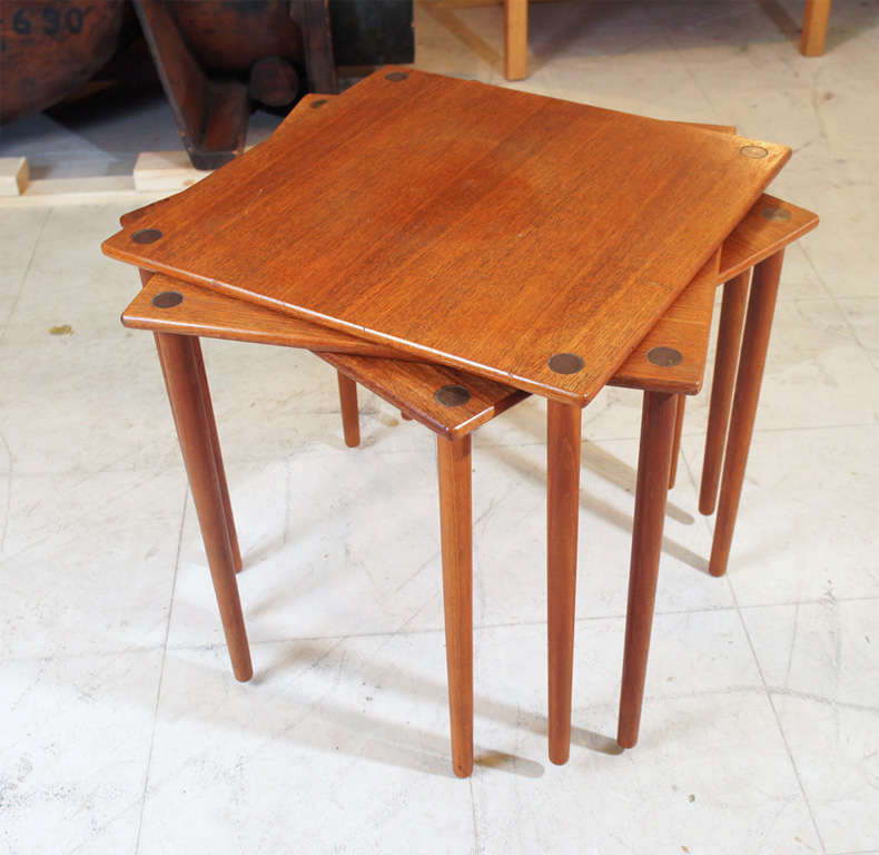 Three square tables in teak, brass circles inlaid in corners. Danish mid-century modern.   All tables are the same size